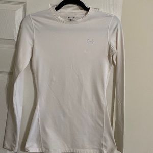 Under Armour cold gear fitted long sleeved white crew top. Size S.